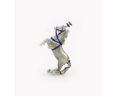 An Italian silver and enamel circus horse, retailed by Tiffany, modelled in a rearing position, with blue reigns and harness,
