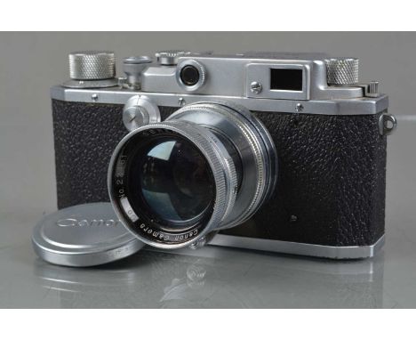 A Canon IIB Rangefinder Camera, made in ocupied Japan, Canon Camera Company LTD, serial no 25548, red diamond emblem to base,