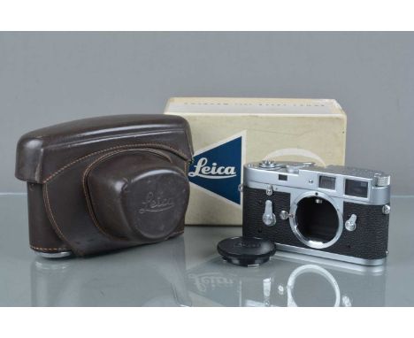 A Leitz Wetzlar Leica M2 Camera Body, serial no 1054234, 1962, shutter working, self timer working, body VG, with body cap, m