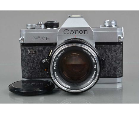 A Canon FTb QL SLR Camera, chrome, serial no 133291, shutter working, meter responsive, self timer working, body G-VG, with C