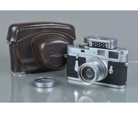 A Leitz Wetzlar Leica M2 Camera, serial no 988 898, 1960, shutter working, self timer working, rangefinder working, body G, l