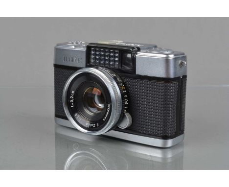 An Olympus PEN D Half Fame Camera, shutter working, light cell responsive, body G-VG, with F Zuiko 3.3cm f/1.9 lens, elements