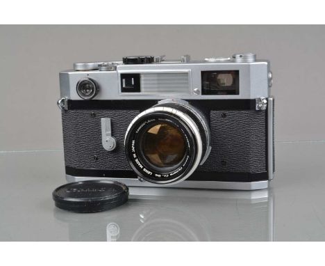 A Canon 7s Rangefinder Camera,  chrome, serial no 106576, shutter working, light cell responsive, rangefinder functions, self