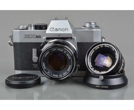 A Canon EX Auto QL SLR Camera, serial no 180181, shutter working, meter responsive, self timer working, body G, slight marks,