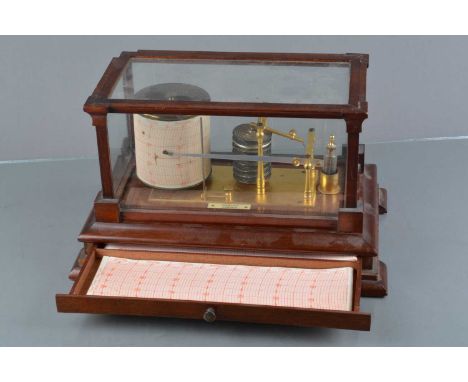 An early 20th Century brass Stanley Aneroid Barograph, in glazed mahogany case, with plinth drawer and carved decoration, 380