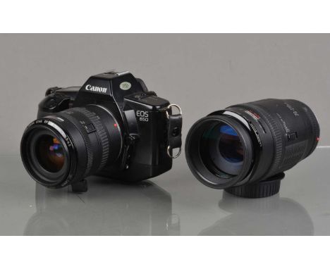 A Canon EOS 650 SLR Camera, shutter working, appears to function as should, body G, some light wear, with Canon EF 28-70mm f/