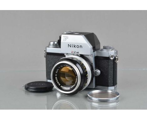 A Nikon F Photomic FTN SLR Camera, chrome, serial no 7211557, shutter not closing on slow speeds, self timer working, finder 