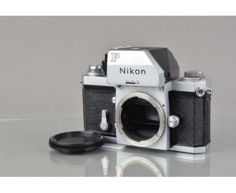 A Nippon Kogaku Nikon F Photomic FTN SLR Camera Body, chrome, red dot serial no 659661, shutter working, finder meter respons