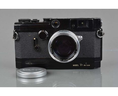 A Canon VT de Luxe VTDZ  Rangefinder Camera,  black, serial no 545048, shutter working, rangefinder functions, rapid wind smo