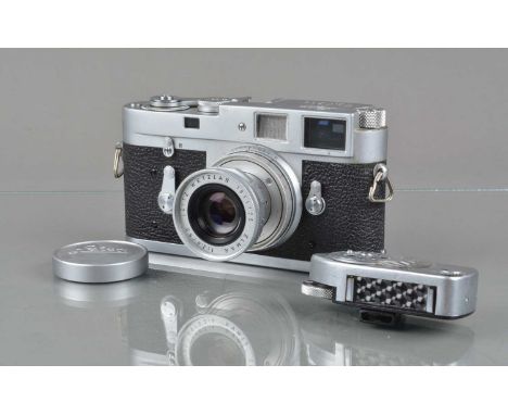 A Leitz Wetzlar Leica M2 Camera, serial no 1037669, 1961, shutter working, viewfinder clear, rangefinder working, self-timer 