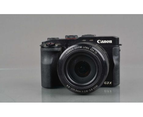 A Canon G3X Digital Camera, powers up, shutter working, appears to function as should, body G, light wear, with charged batte