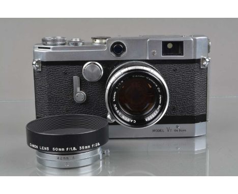 A Canon VT de Luxe VTDZ  Rangefinder Camera,  chrome, serial no 552960,  shutter working, rangefinder functions, rapid wind s