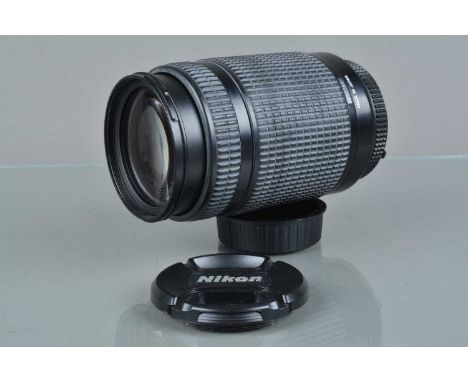 A Nikon ED AF Nikkor 70-300m f/4-5.6D Lens, serial no 294780, auto focus working, barrel G, some light fading to grip, some b