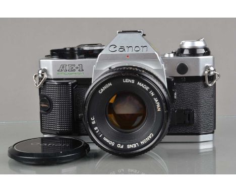 A Canon AE-1 Program SLR Camera, chrome, serial no 3695561, shutter working, meter responsive, self timer working, body G-VG,