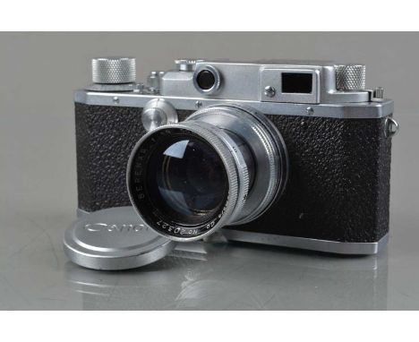 A Canon IIB Rangefinder Camera, made in ocupied Japan, Canon Camera Company LTD, seial no 25496, red diamond emblem to base, 