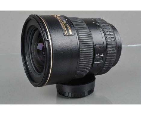 A Nikon DX AF-S Nikkor 17-55mm f/2.8G ED Lens, serial no 383679, auto focus working, barrel F-G, sme damage to focus grip, el