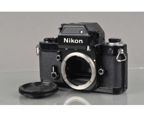 A Nikon F2SB Photomic SLR Camera Body, black, serial no 7533019, shutter working, self timer working, DP-3 finder, meter resp