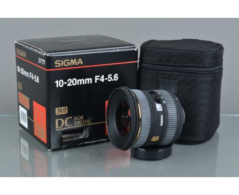 A Sigma DX 10-20mm f/4-5.6 DC HSM Lens, Nikon AF mount, serial no 2034557, auto focus working, barrel G-VG, some fading to gr