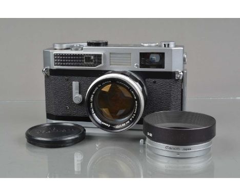 A Canon 7 Rangefinder Camera, chrome, serial no 935665, shutter working, light cell responsive, rangefinder functions, self t