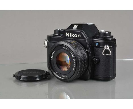 A Nikon EM SLR Camera, black, serial no 6355314, shutter working, meter responsive, self timer working, body VG, with Nikon S