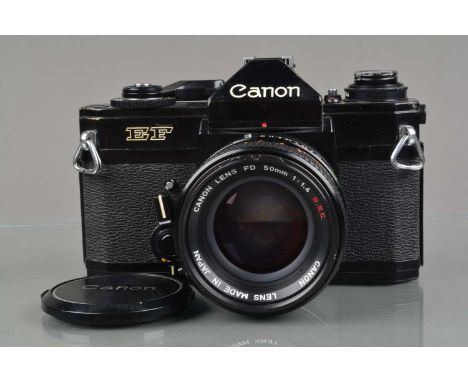 A Canon EF SLR Camera, black, serial no 332975, shutter working, meter responsive, self timer working, body G, some brassing 