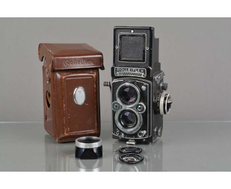 A Rolleiflex 3.5E TLR Camera, type 1, serial no 1760411, shutter sluggish on slow speeds, meter responsive, body G, some scuf