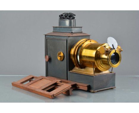 An early 20th Century Russian iron and lacquered brass Wrench Magic Lantern,  with 7 inch lens and gas illuminant, possibly l