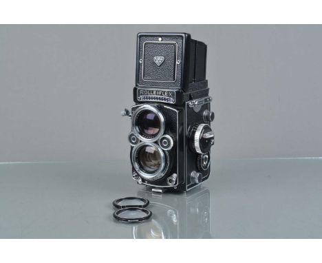 A Rolleiflex 2.8F TLR Camera, serial no 2429788, shutter slightly sluggish on slow speeds, meter responsive, body G-VG, with 