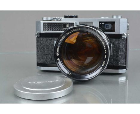 A Canon 7 Rangefinder Camera, chrome, serial no 884687, shutter working, light cell responsive, self timer working, body G-VG