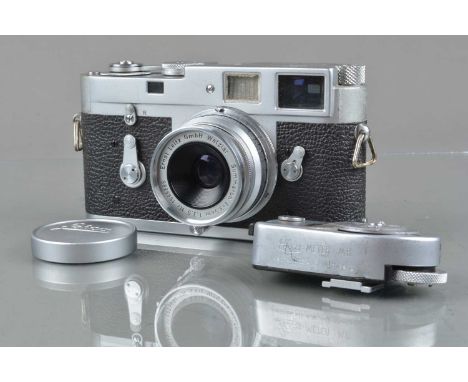 A Leitz Wetzlar M2 Camera, serial no 988718, 1960, shutter working, viewfinder clear, rangefinder working, self-timer working