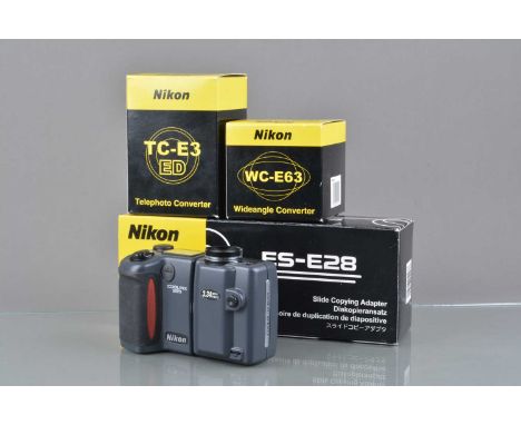 A Nikon Coolpix 995 Digital Camera, powers up, shutter working, flash working, appears to function as should, body VG, elemen