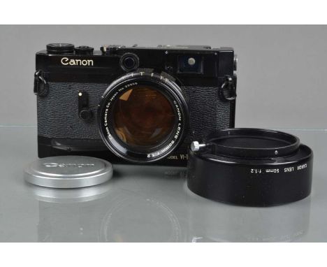 A Canon VI-T Rangefinder Camera, black, serial no 601759, shutter working, rangefinder functions, rapid wind smooth, self tim