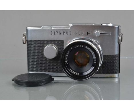 An Olympus PEN FT Half Frame Camera,  shutter working, meter responsive, self timer sticking, body F-G, missing left hand scr