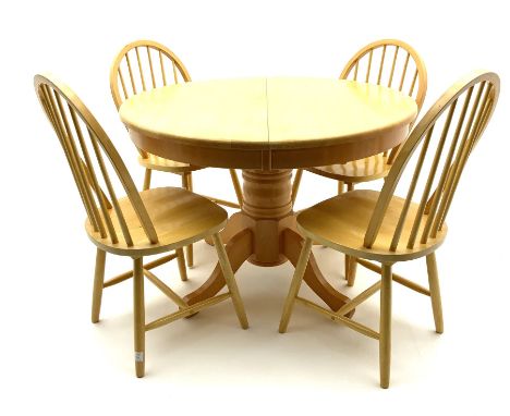 Light wood circular extending dining table and four hoop back chairsDimensions: Depth/Diameter:&nbsp;107cm