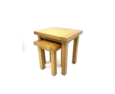 Light oak nest of two tablesDimensions: Height:&nbsp;51cm&nbsp; Length/Width:&nbsp;50cm&nbsp; Depth/Diameter:&nbsp;40cm