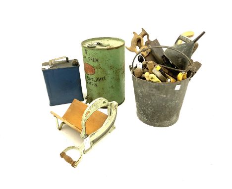 Vintage tools in galvanised bucket, petrol and oil cans, vintage slicer