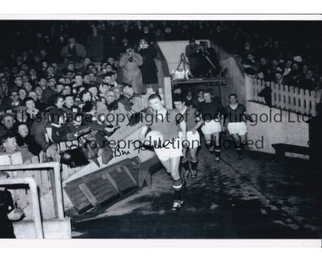 BILL FOULKES 1958     Two autographed 12 x 8 photos of the Manchester United captain leading his team out at Old trafford pri
