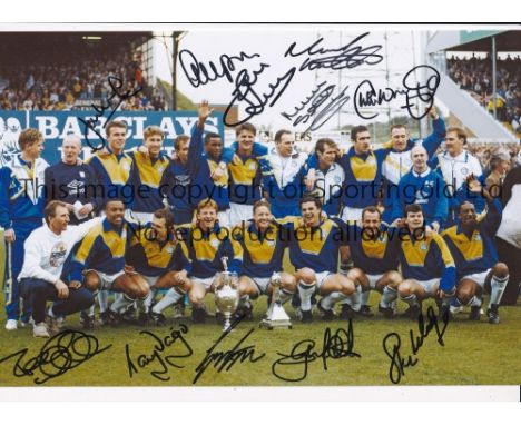 LEEDS UNITED 1992      Autographed 12 x 8 photo of the players posing with the First Division trophy at Elland Road prior to 
