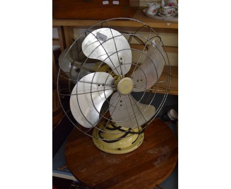 VINTAGE LIMIT ELECTRIC FAN AND A REVOLVING WOODEN TABLE STAND