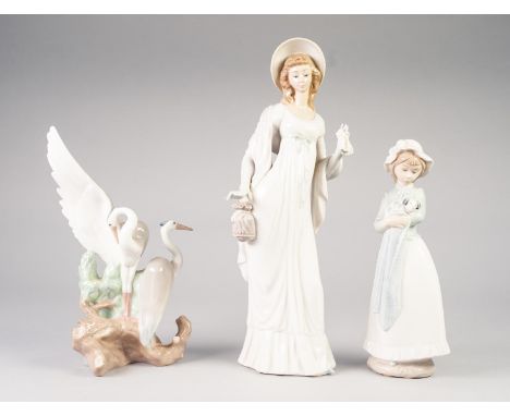 LLADRO PORCELAIN FEMALE FIGURE, 14in (35.5cm) high, also TWO NAO PIECES (3) 