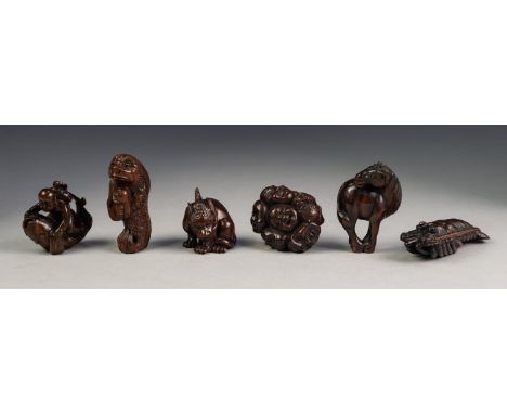 SEVEN VARIOUS TWENTIETH CENTURY JAPANESE WELL CARVED HARDWOOD NETSUKE, (7)