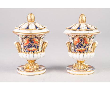 A PAIR OF EARLY NINETEENTH CENTURY DERBY PORCELAIN 'JAPAN' DECORATED TWO HANDLED CAMPANA SHAPE POT POURRI VASE  AND INKWELL, 