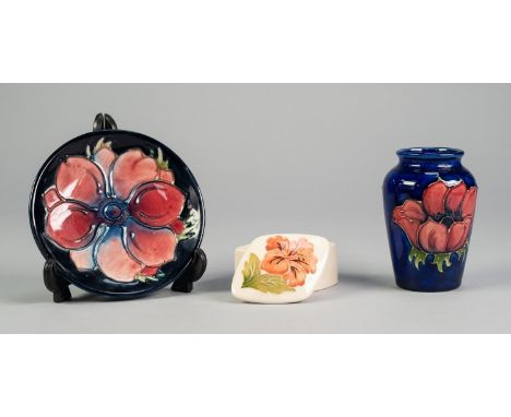 THREE SMALL PIECES OF WALTER MOORCROFT TUBE LINED POTTERY, comprising: ANENOME VASE, on a blue ground, 3 ½? (8.9cm) high, ANE