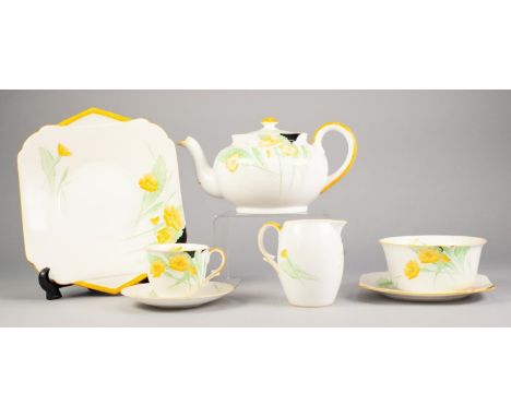 TWENTY THREE PIECE SHELLEY CHINA TEA SERVICE FOR SIX PERSON, painted with small yellow flowers, within yellow lined rims, com