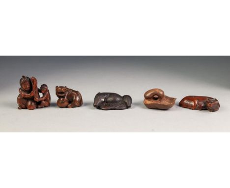 JAPANESE MEIJI PERIOD CARVED WOOD NETSUKE, modelled as a woman kneeling beside a mythical creature, signed, together with FOU
