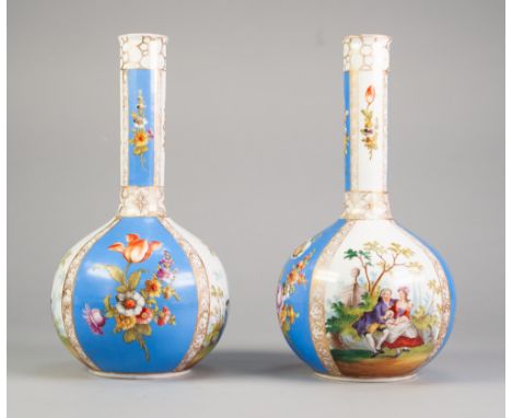 PAIR OF EARLY TWENTIETH CENTURY ‘HELENA WOLFSOHN’ PORCELAIN BOTTLE VASES, each of footed form, painted with alternating panel