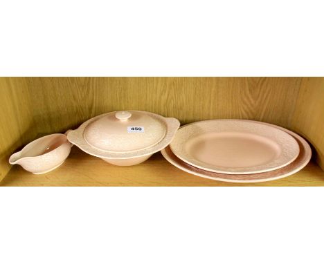 Two unusual Clarice Cliff pink meatplates with incised decoration, a matching tureen and sauceboat.