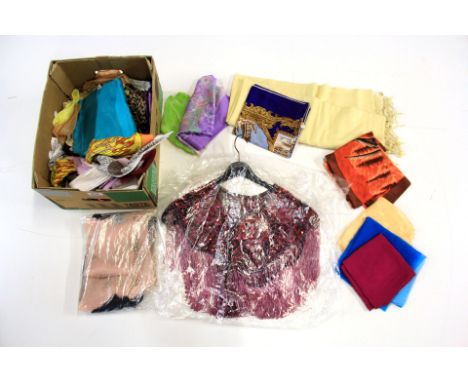 A beaded cape and a quantity of vintage scarves.