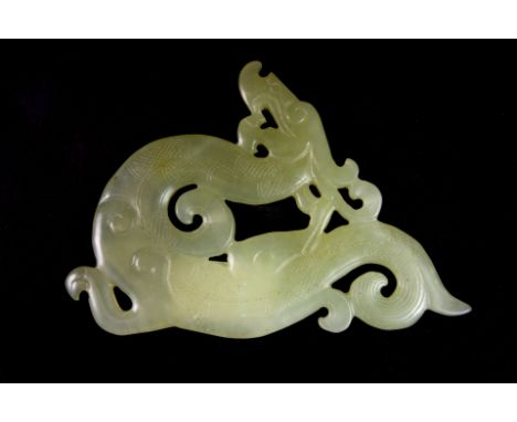 A 19th/early 20th century Chinese carved nephrite jade dragon, 15cm x 10 x 0.6cm.