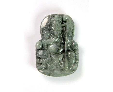 A Chinese carved jadeite jade amulet, H. 5.5cm.